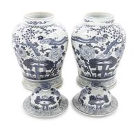 Two Pairs of Chinese Blue and White Porcelain Jars and Covers