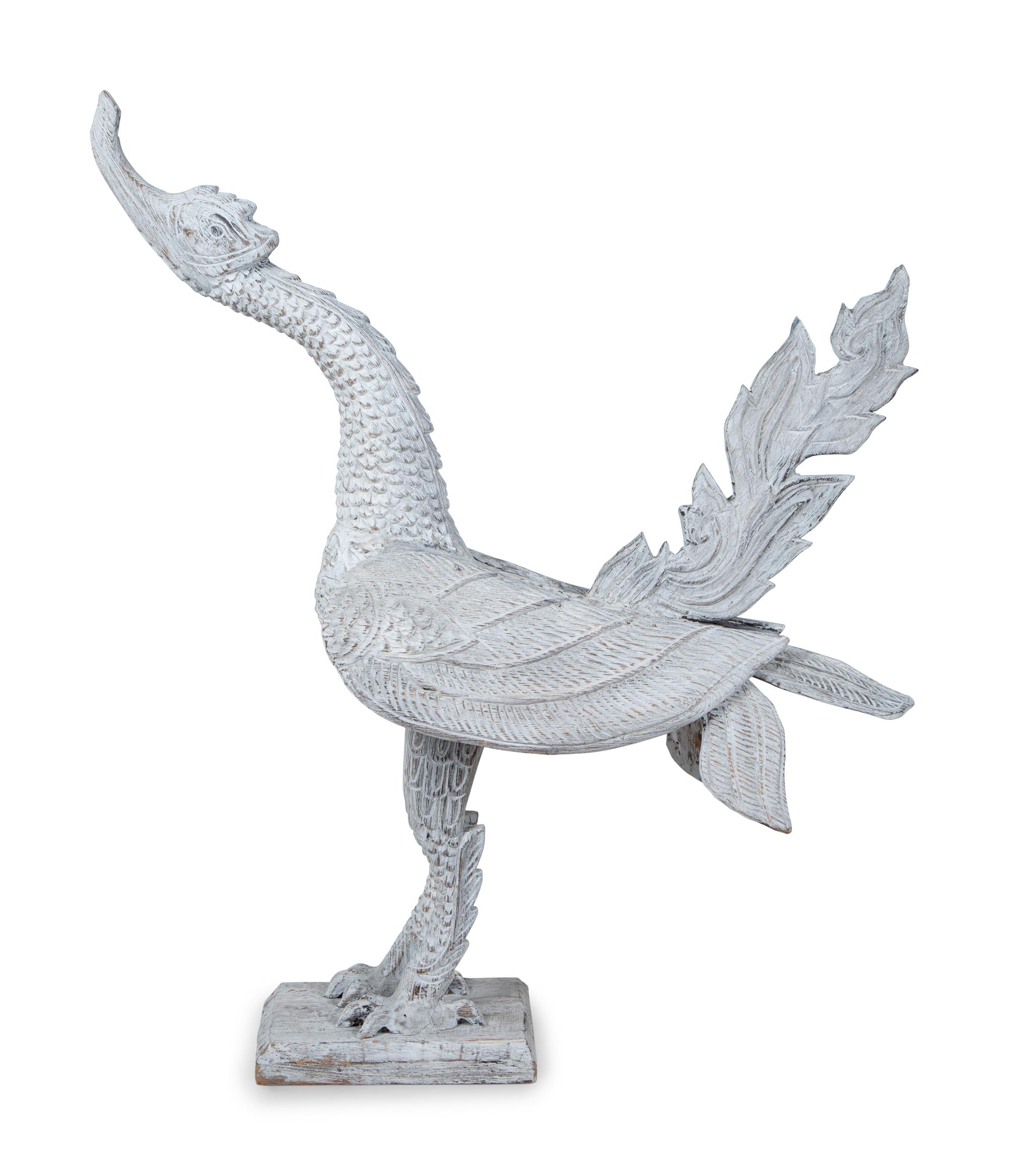 An Indonesian Carved and White-Painted Garuda — 20TH CENTURY