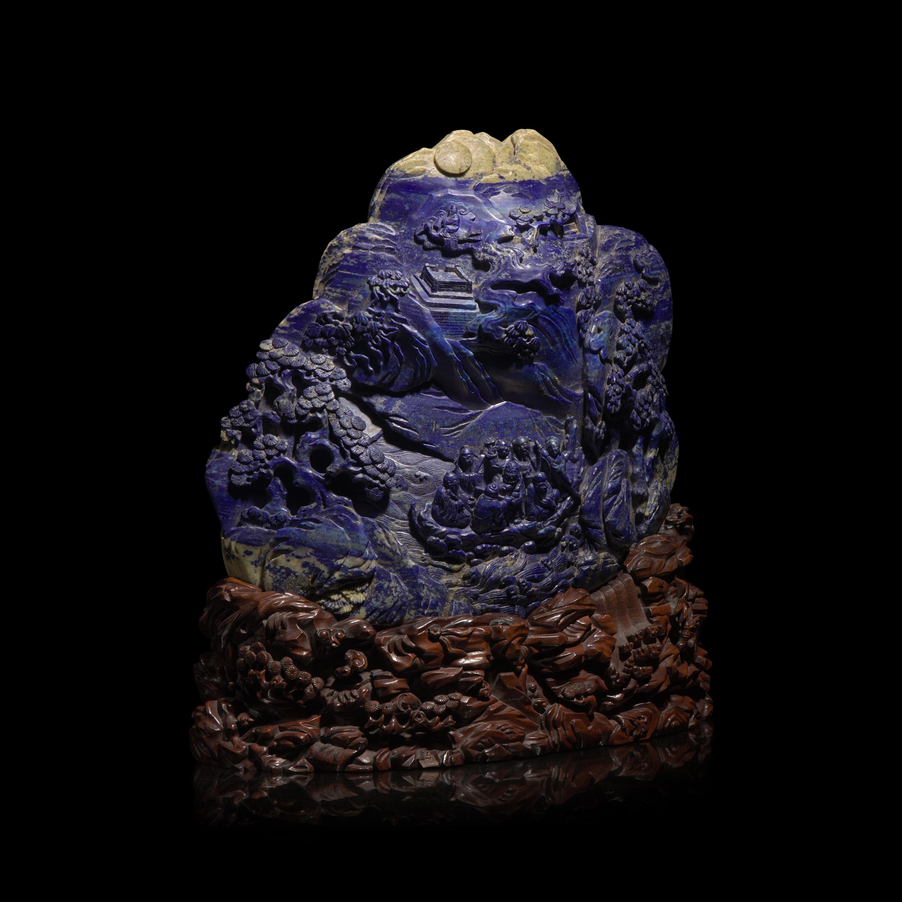 A Large Chinese Lapis Lazuli 'Eight Immortals Crossing the River' Boulder, Qing Dynasty — 清 青金石雕羅漢渡江山子