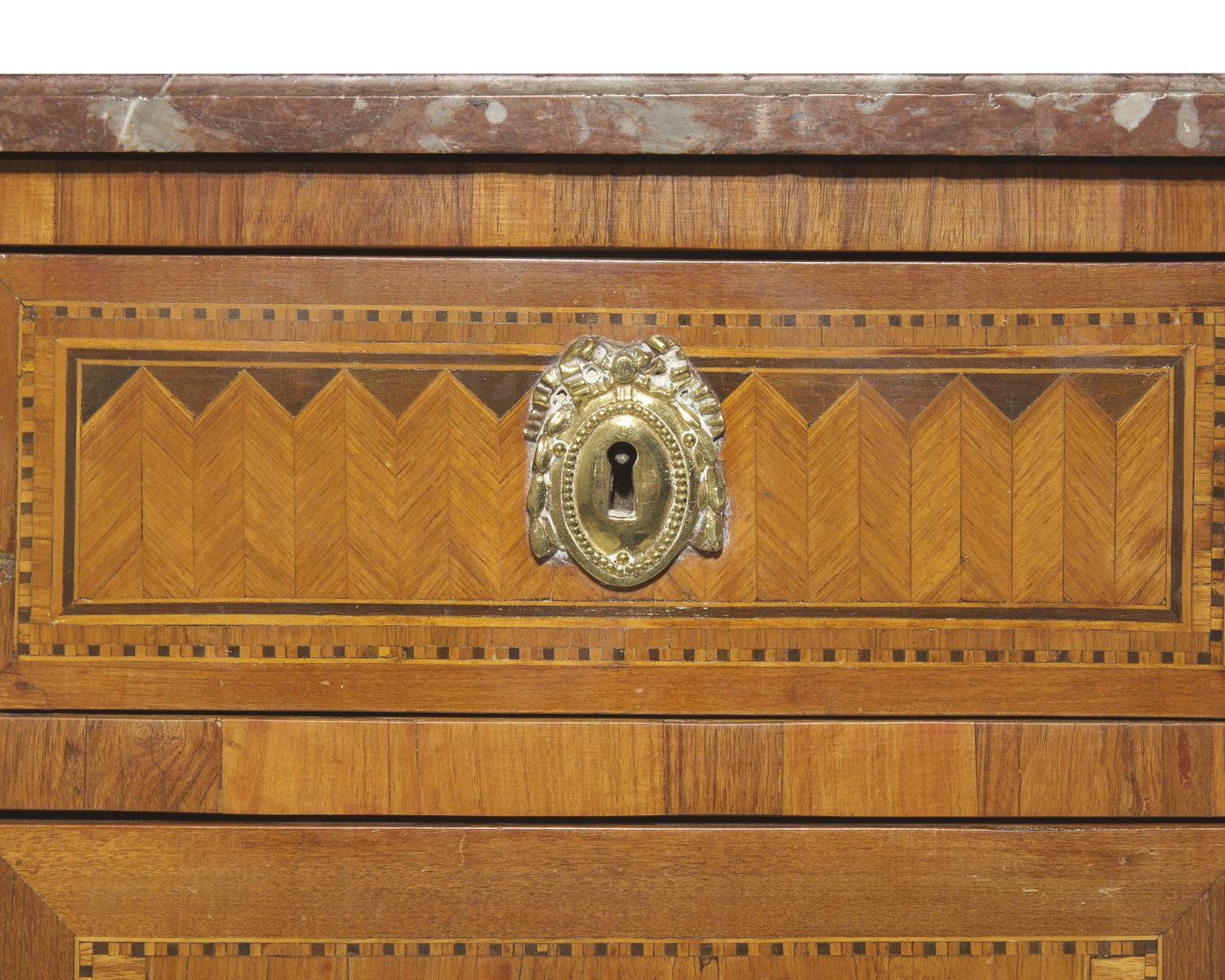 A French Directoire parquetry mahogany commode with red breccia marble top, circa 1800