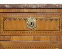 A French Directoire parquetry mahogany commode with red breccia marble top, circa 1800