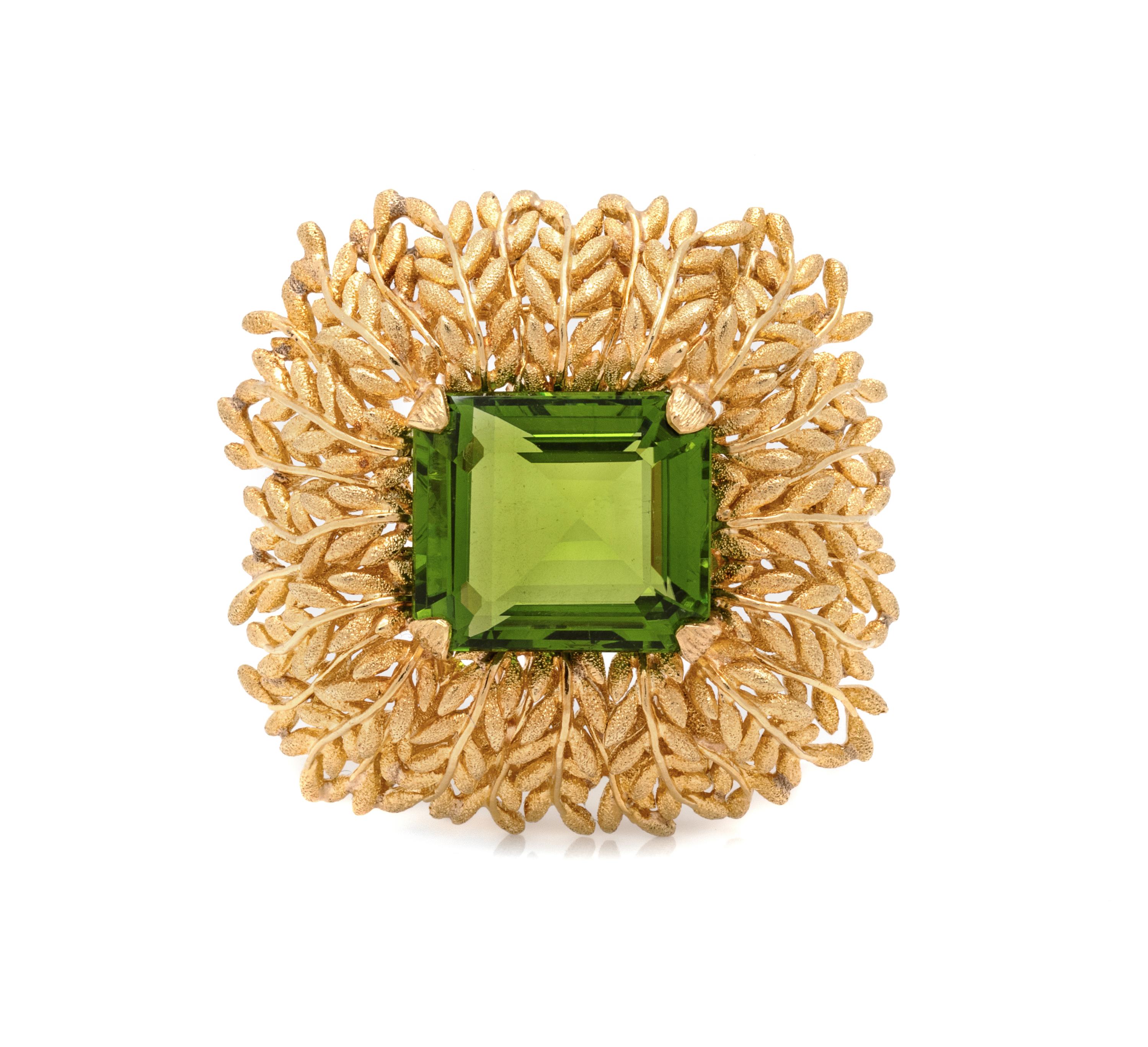 F.J. COOPER, YELLOW GOLD AND PERIDOT BROOCH
