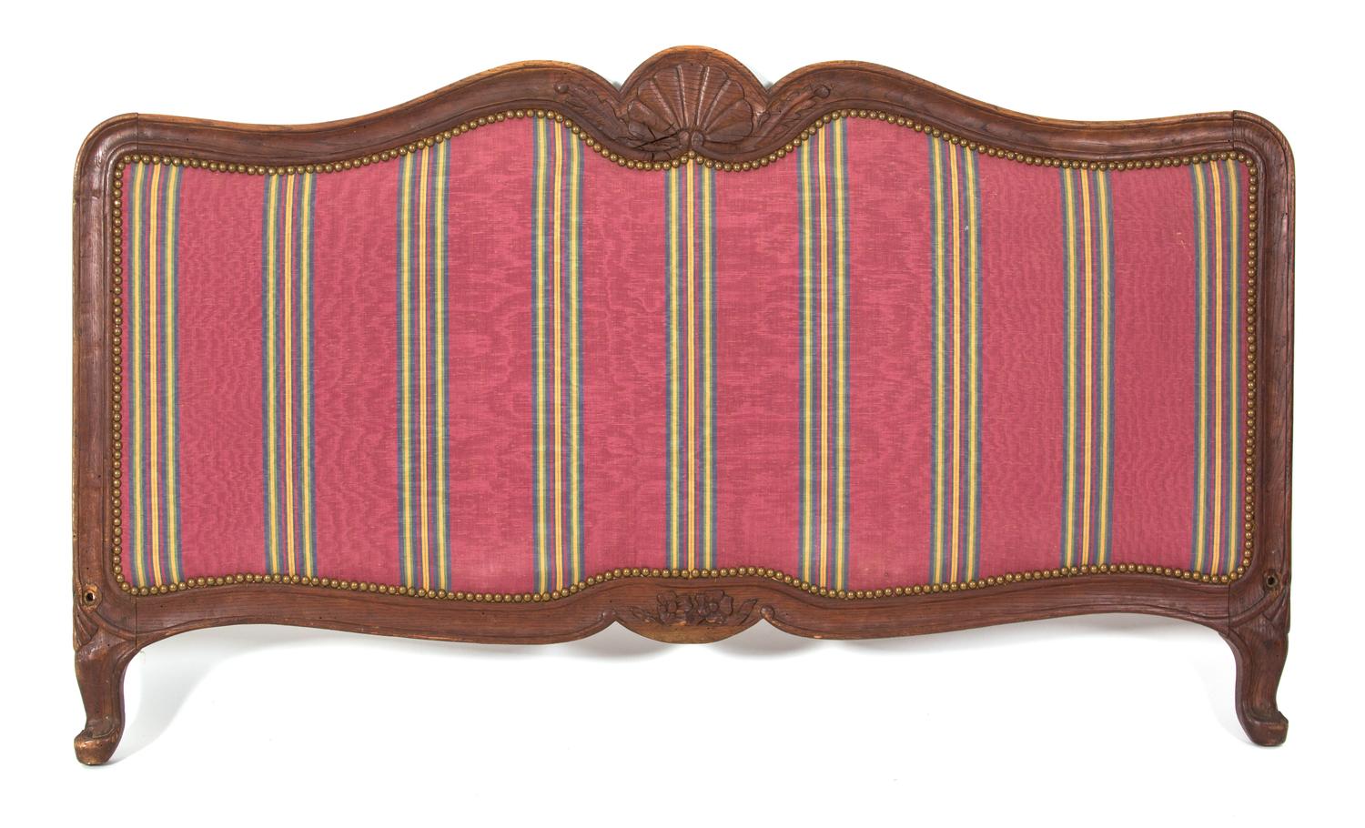 A Louis XV Style Carved Walnut and Upholstered Headboard and Footboard Height 35 x width 58 x depth 82 inches. — LATE 19TH/EARLY 20TH CENTURY