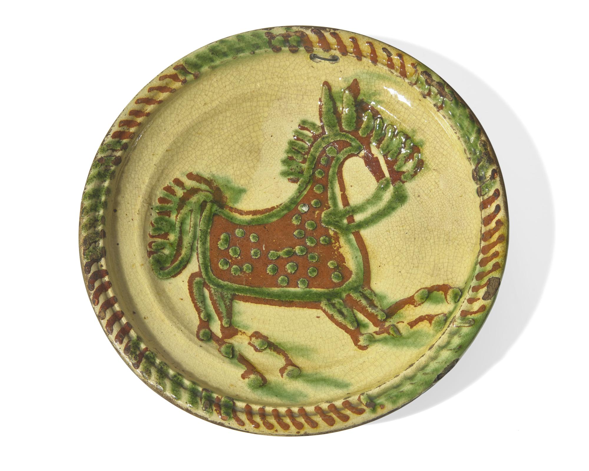 A Slip-Decorated Earthenware Plate with Horse, 20th Century