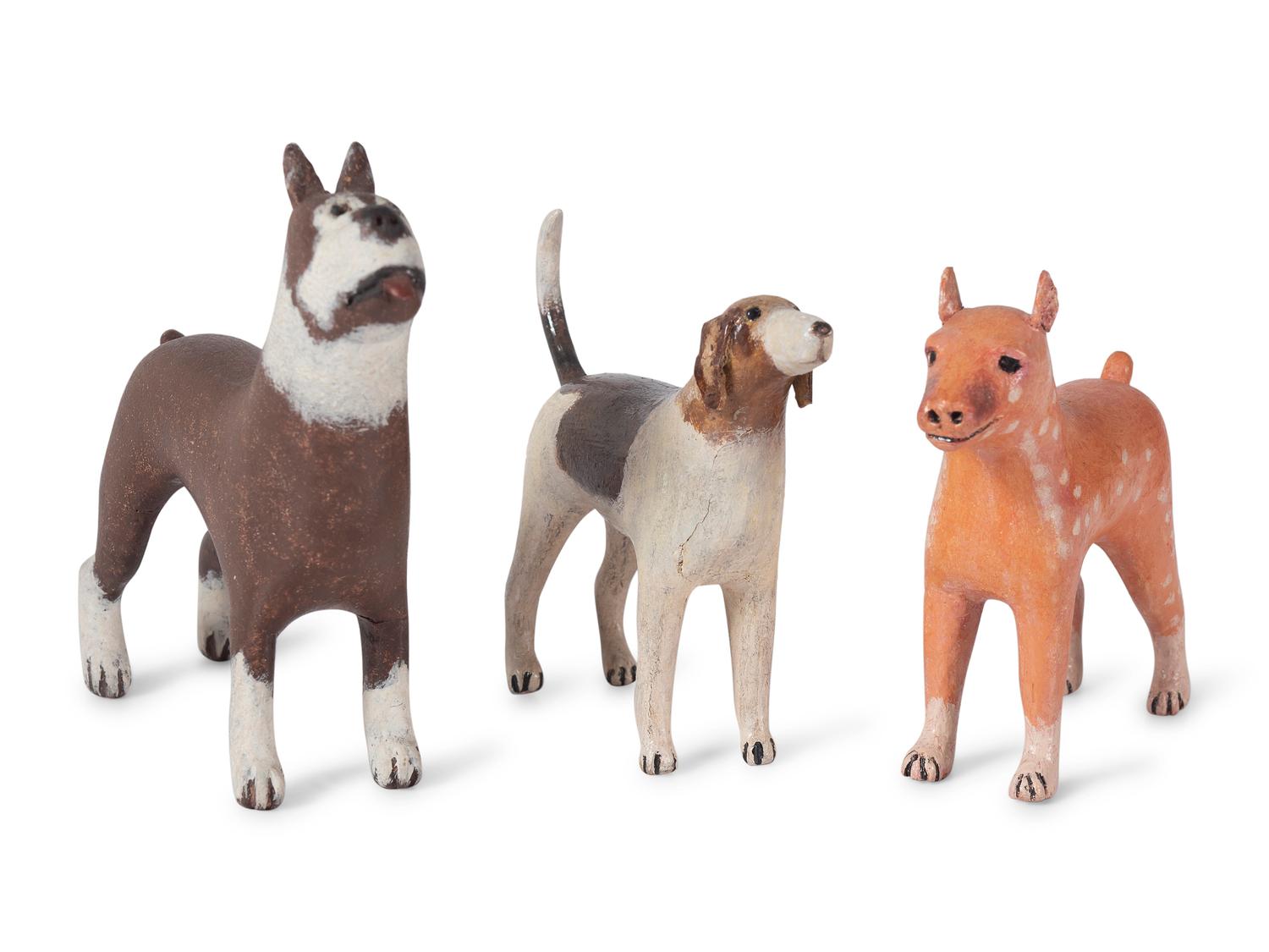 Four Folk Art Painted Wood Dog Figures