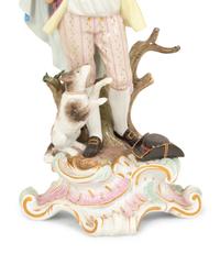 A Pair of Meissen Porcelain Figural Candelabra