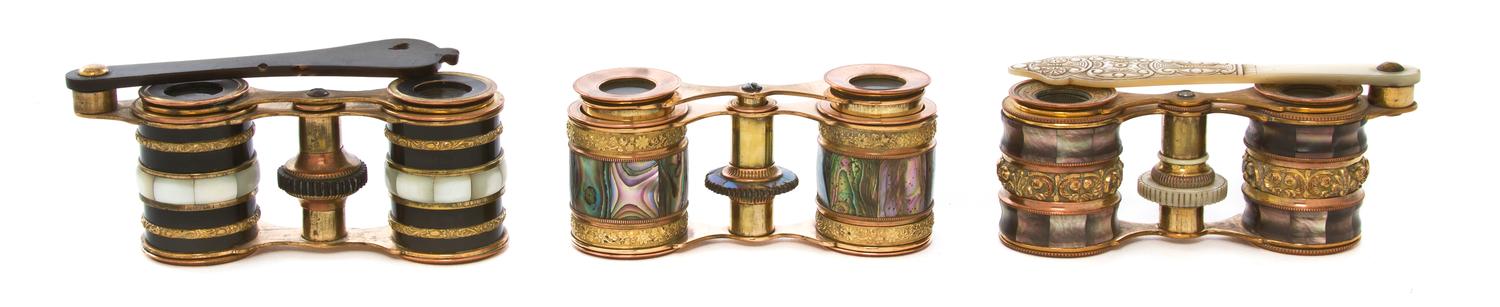 Three Pairs of Continental Abalone or Mother-of-Pearl Veneered Opera Glasses, Width of first 3 7/8 inches.