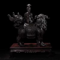 A large Japanese patinated bronze figural censer depicting a Bodhisattva on a lion 日本铜加漆菩萨骑狮像 19th/20th century ???????