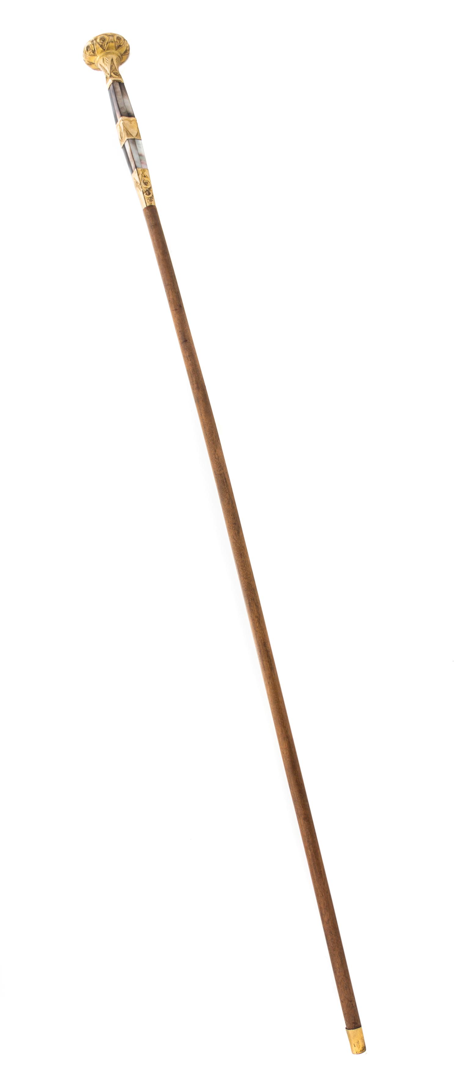 A Gilt Metal and Mother-of-Pearl Mounted Walking Stick Length 39 inches.