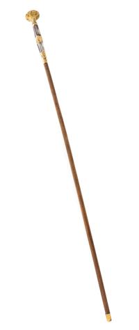A Gilt Metal and Mother-of-Pearl Mounted Walking Stick Length 39 inches.