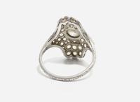 A Ladies Art Deco Platinum and Diamond Ring