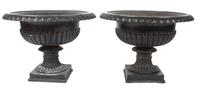 A Pair of Victorian Iron Garden Urns Height of each 22 x diameter 31 inches.