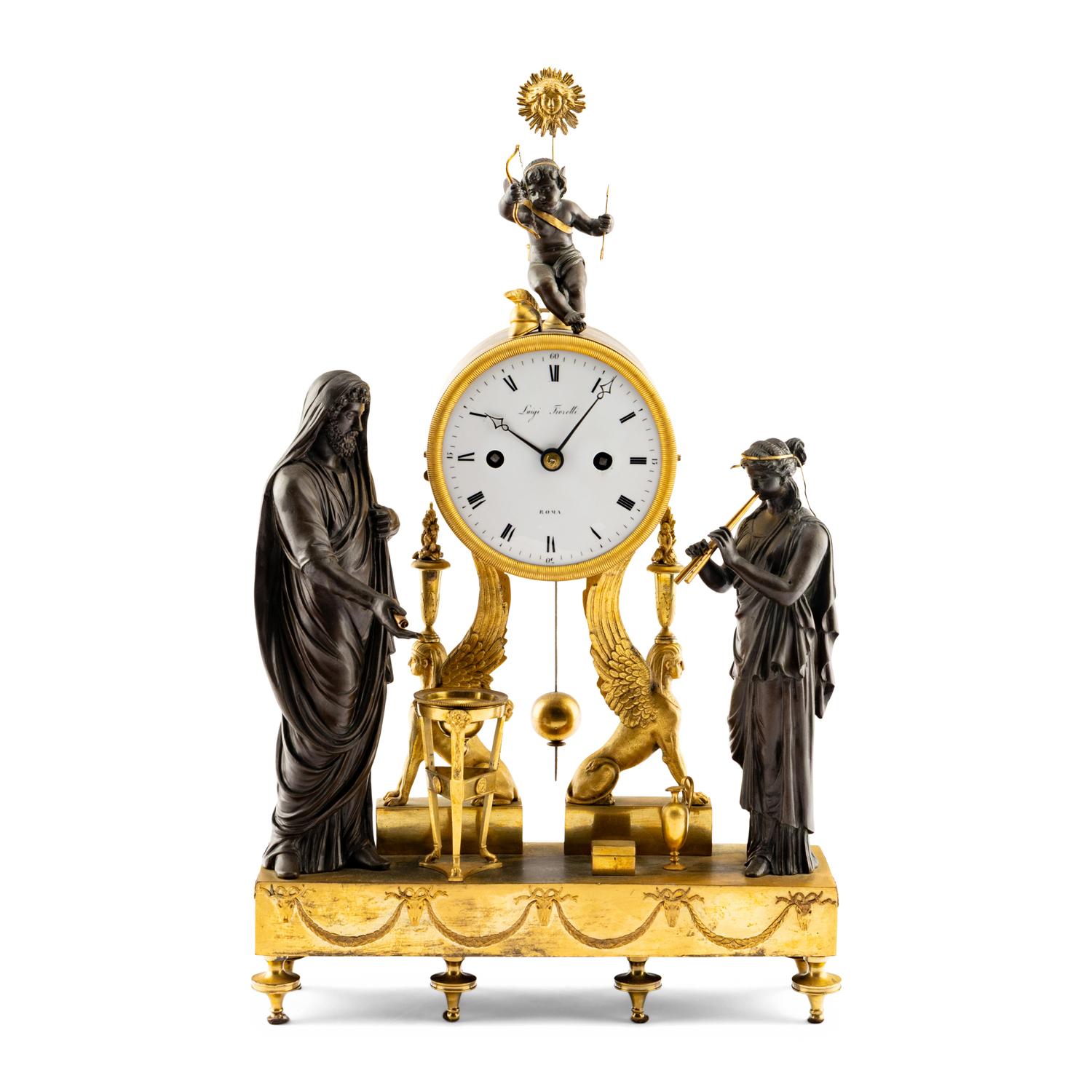 An Empire Style Gilt and Patinated Bronze Mantel Clock
