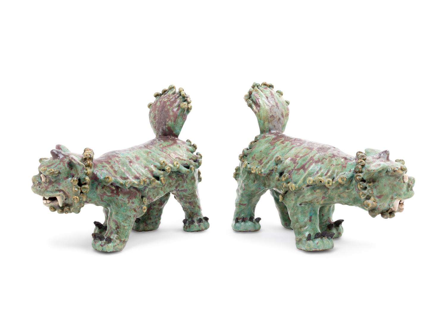 A Pair of Shiwan Red and Green Glazed Stoneware Figures of Fu Lions