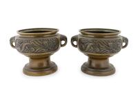 A Pair of Japanese Bronze Two-Handled Urns — MEIJI PERIOD