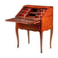 A Louis XV Style Gilt Bronze Mounted Tulipwood Parquetry Bureau en Pente