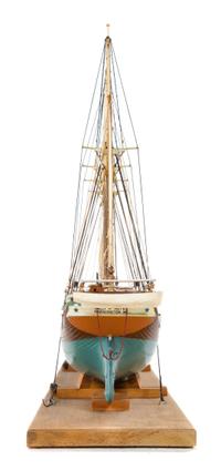 A Model of the 1917 Four-Masted Schooner "Sally P. Noyes" Height 14 1/2 x length of base 28 inches.