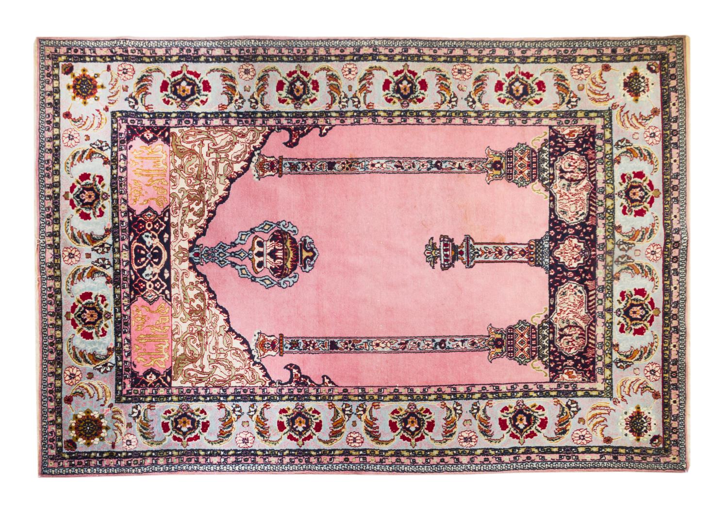 A Turkish Wool Prayer Rug 5 feet 10 1/2 inches x 4 feet.