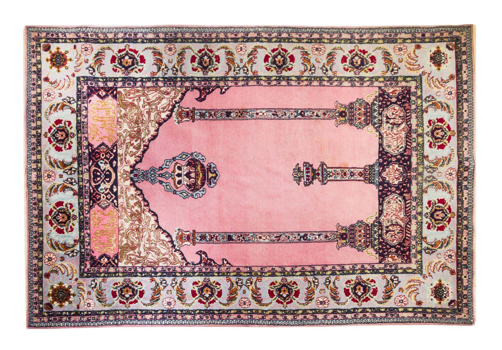A Turkish Wool Prayer Rug 5 feet 10 1/2 inches x 4 feet.