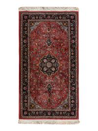 A Kashan Wool Rug