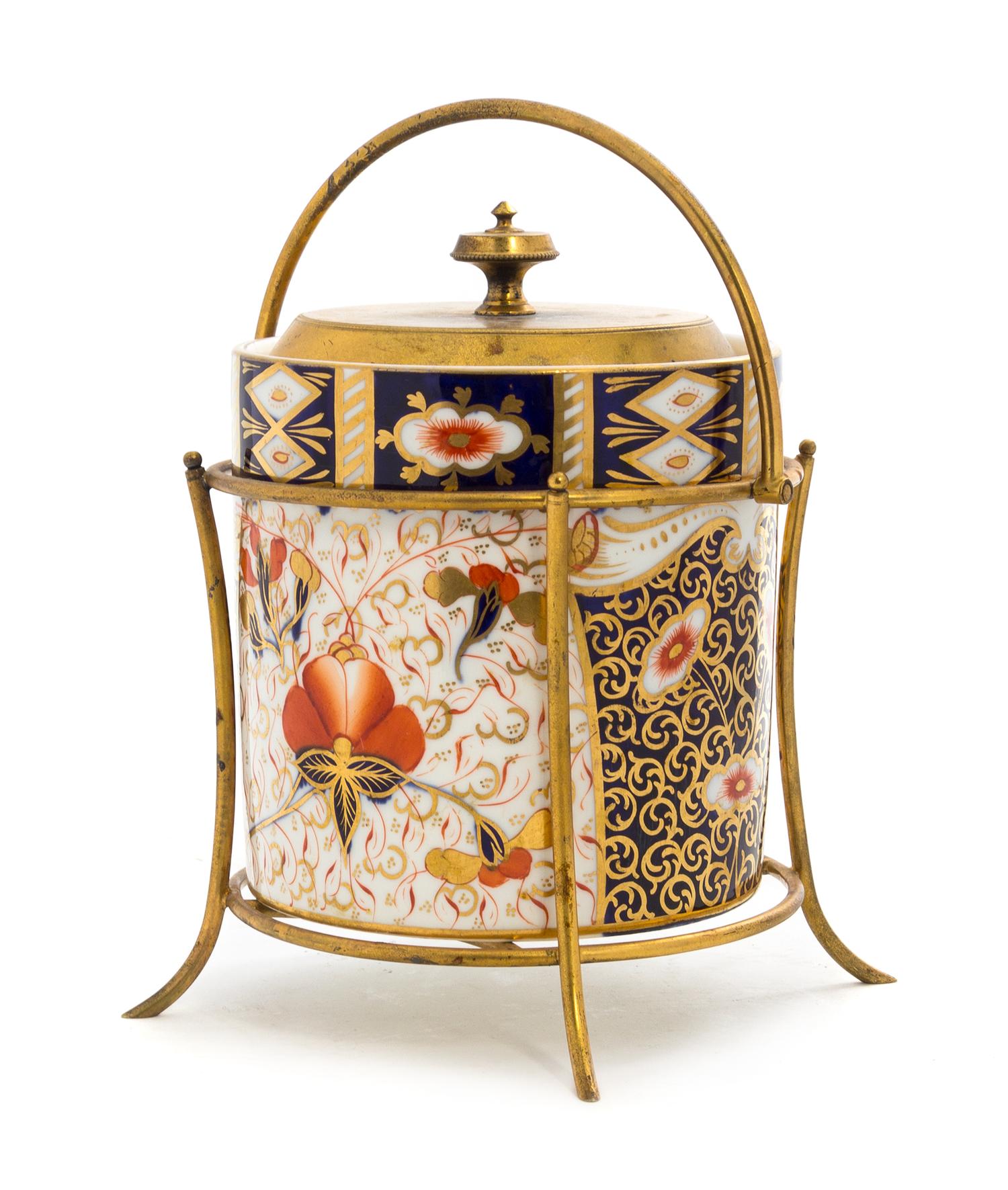 A Gilt Metal Mounted Davenport Porcelain Biscuit Barrel Height 8 inches.