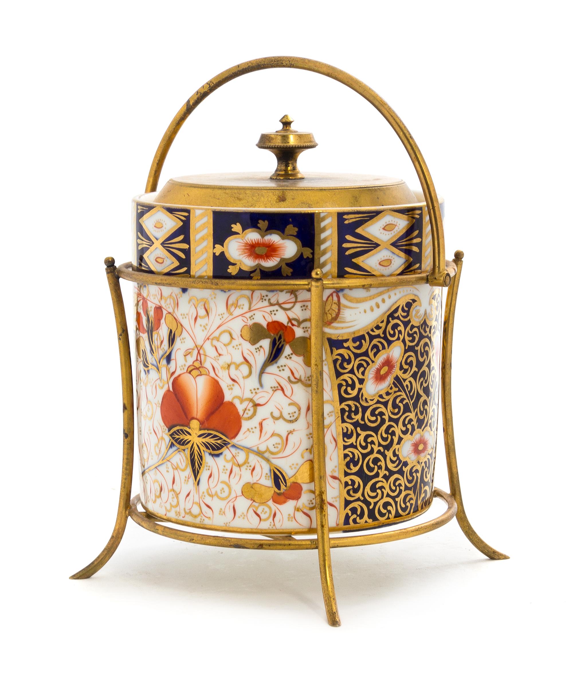 A Gilt Metal Mounted Davenport Porcelain Biscuit Barrel Height 8 inches.