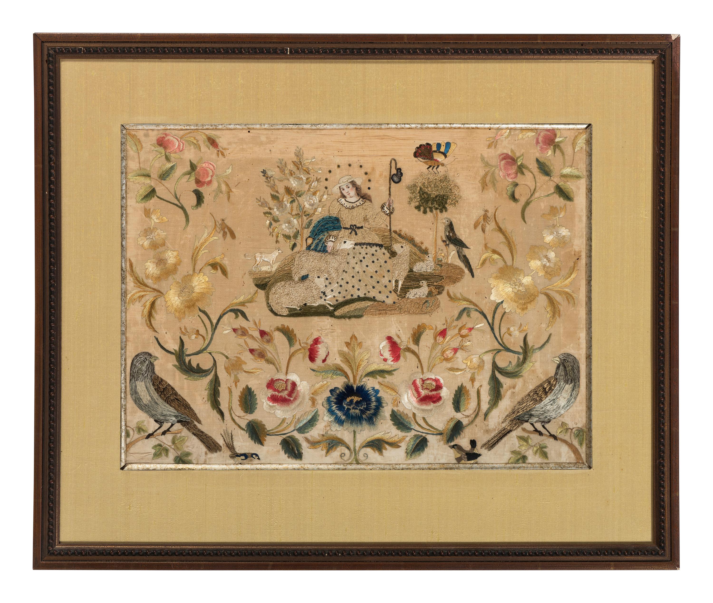 A Needlework Embroidered Picture of a Shepherdess with Flock