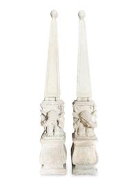 A Pair of Cast Stone Obebelisks on Elephant-Form Pedestals