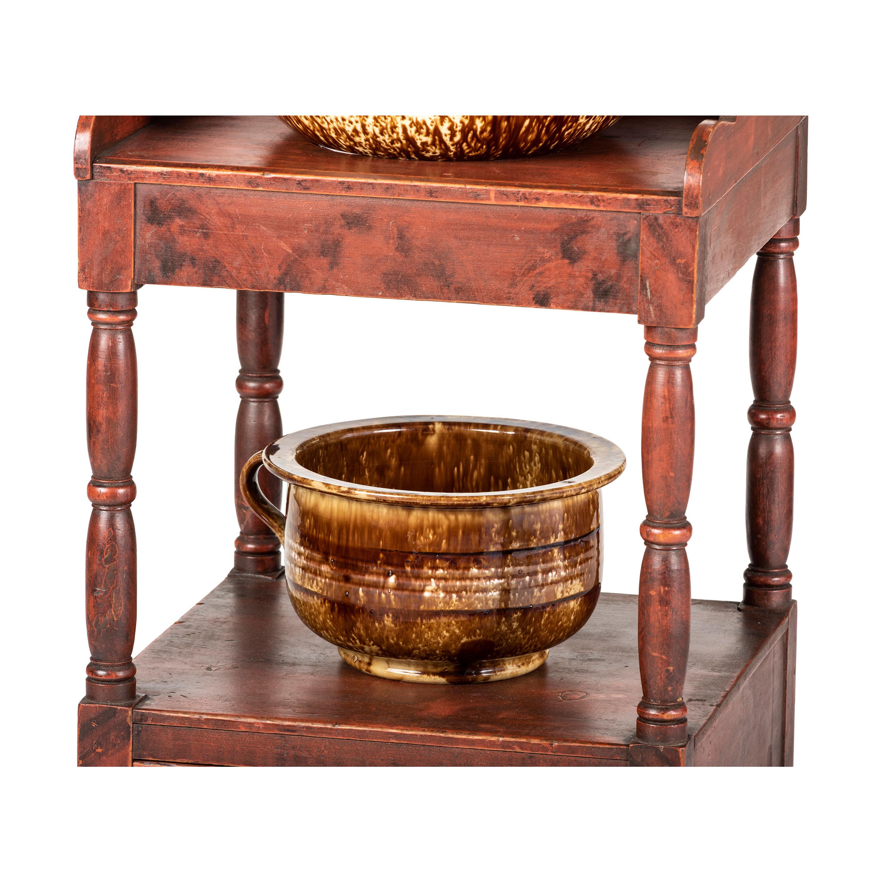 A Painted Wood Wash Stand with a Flint Enamel Water Pitcher and Wash Basin