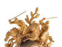 A French Gilt Metal and Alabaster Mantel Clock