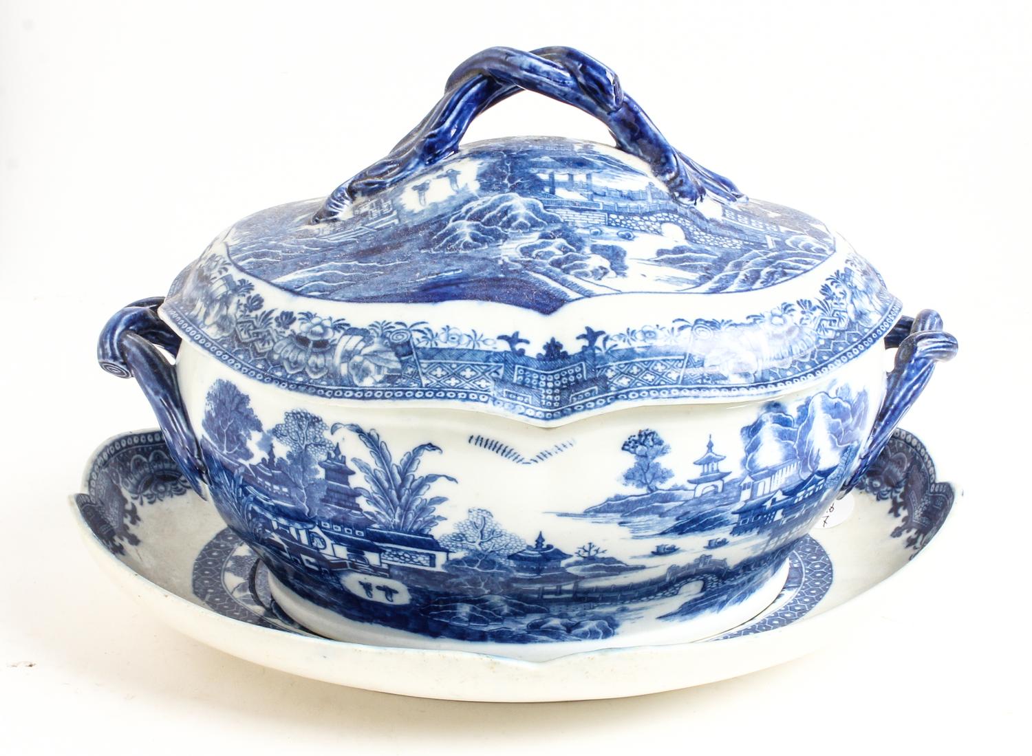 An English Blue and White Porcelain Soup Tureen and Undertray Length of undertray 13 inches.