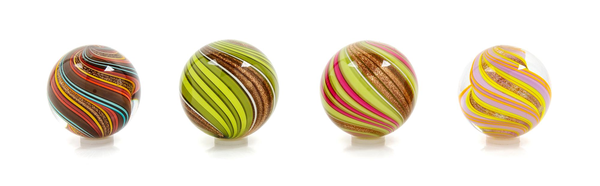 Mark Matthews, (American, b. 1948), Collection of Four Art Glass Marbles