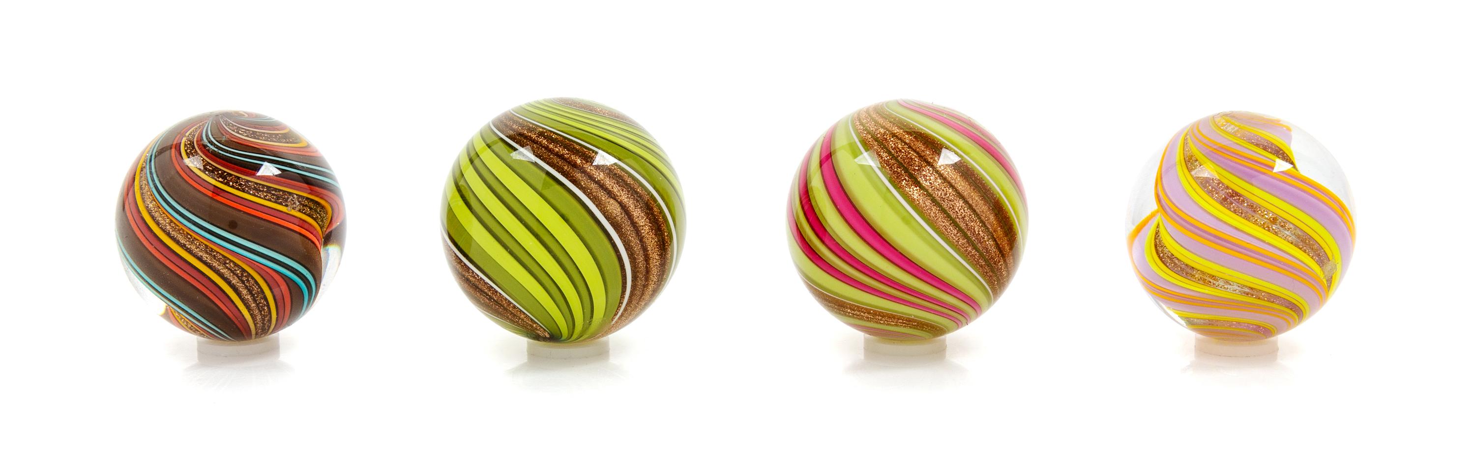 Mark Matthews, (American, b. 1948), Collection of Four Art Glass Marbles
