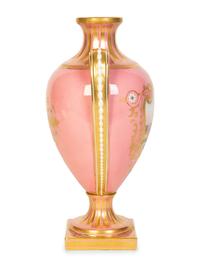 A Coalport Porcelain Pink-Glazed Urn