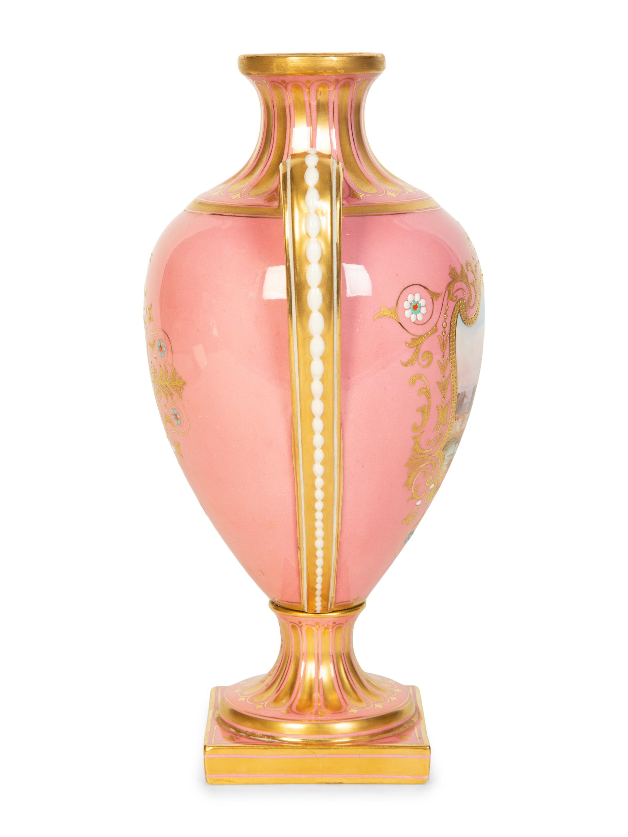 A Coalport Porcelain Pink-Glazed Urn
