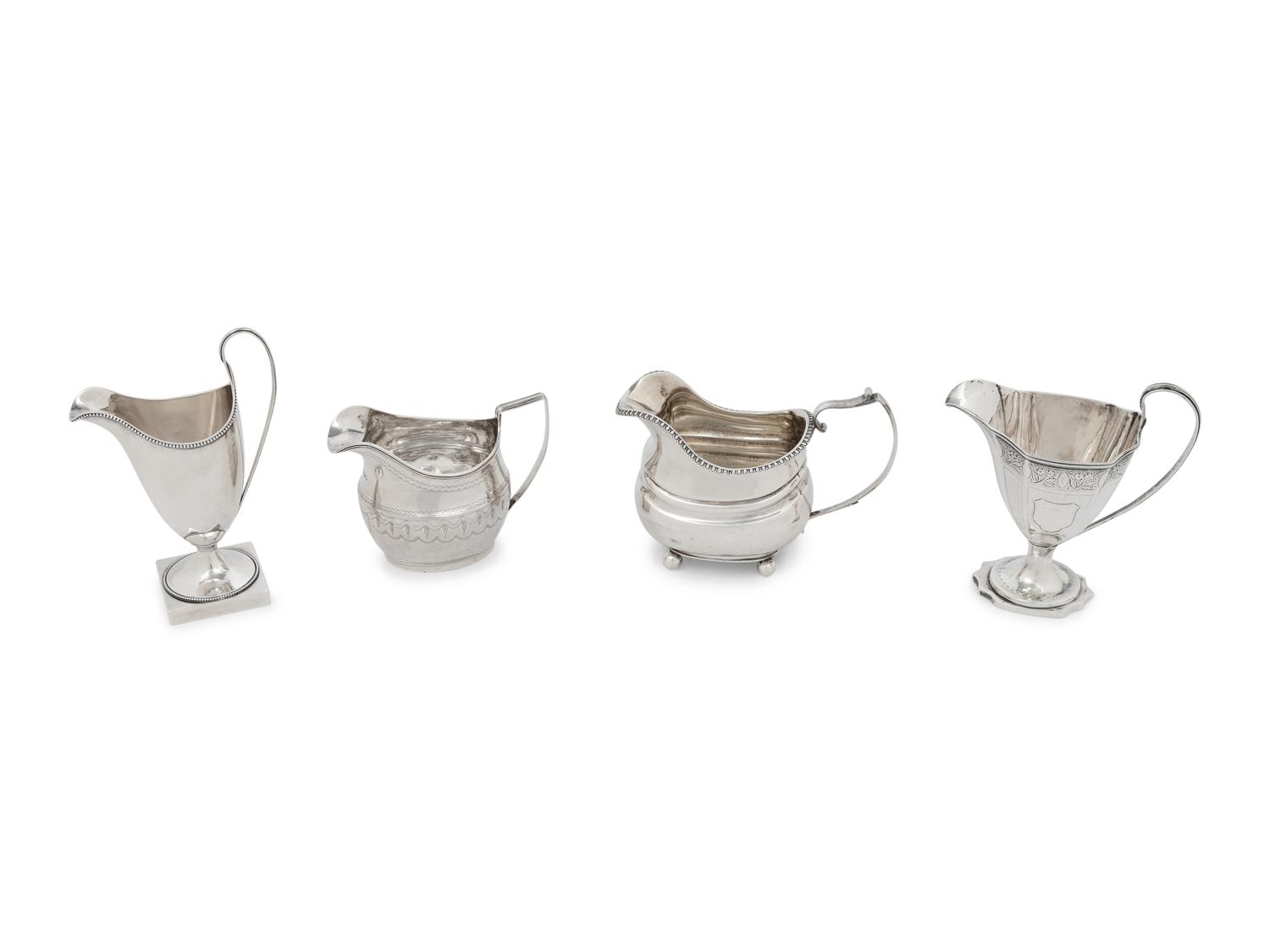 A Group of Four English Silver Creamers
