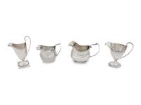 A Group of Four English Silver Creamers