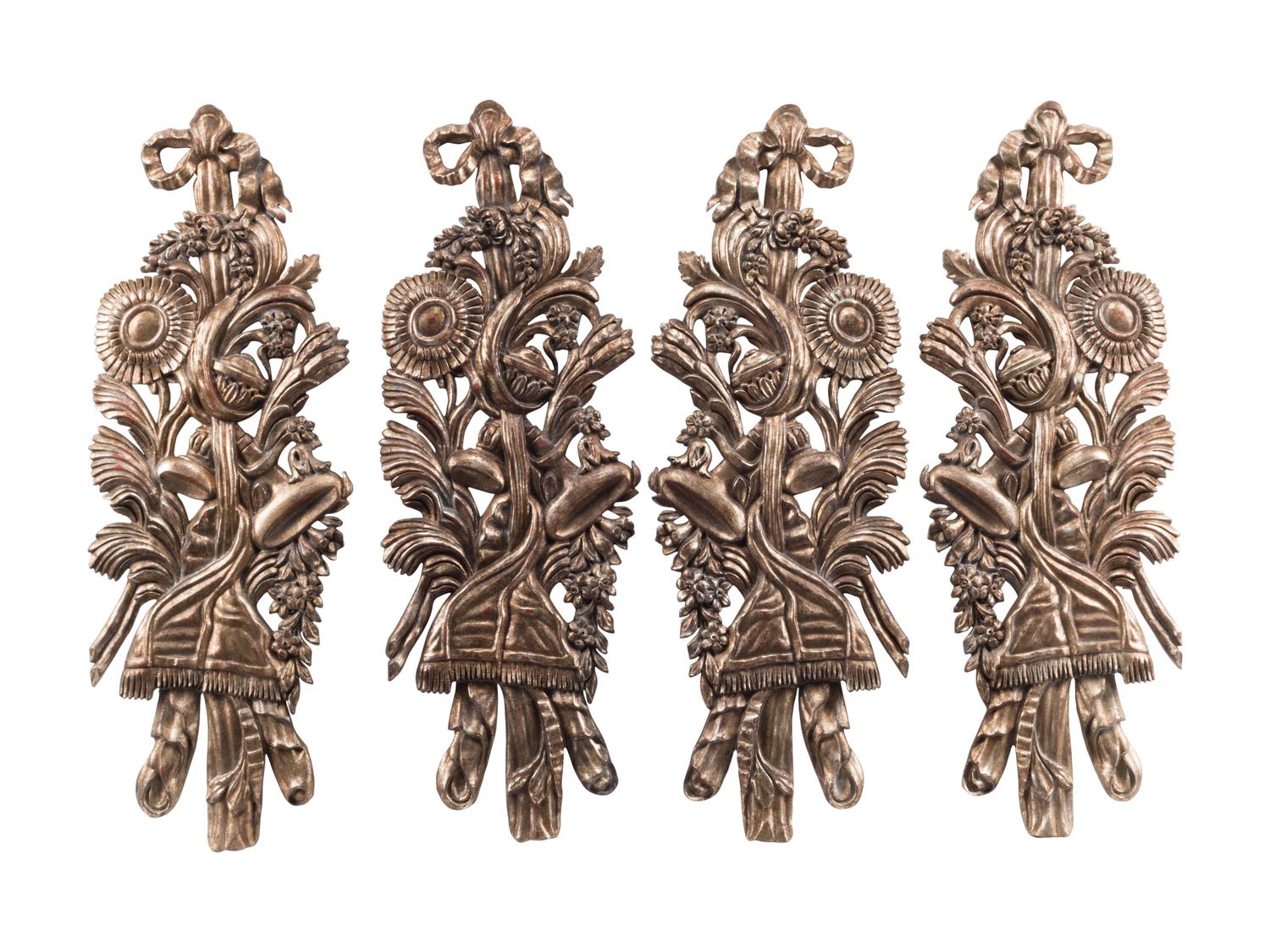 A Set of Four Large Italian Giltwood Trophy Plaques