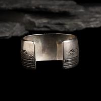 Norbert Peshlakai (Diné, b. 1953) — Silver and Turquoise Cuff Bracelet, with Rabbits