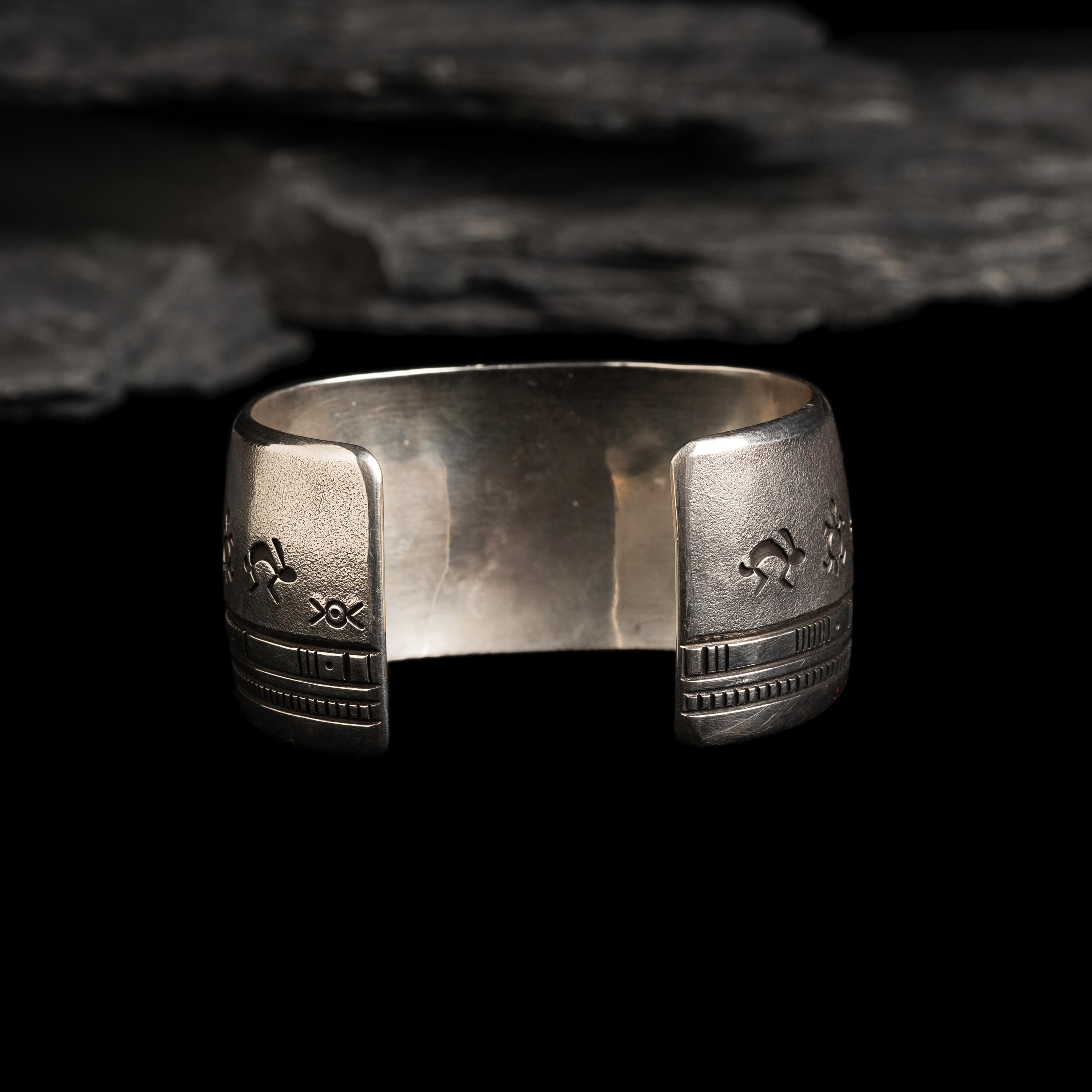 Norbert Peshlakai (Diné, b. 1953) — Silver and Turquoise Cuff Bracelet, with Rabbits