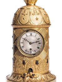 A Charles X Ormolu and Patinated Bronze Beehive Clock