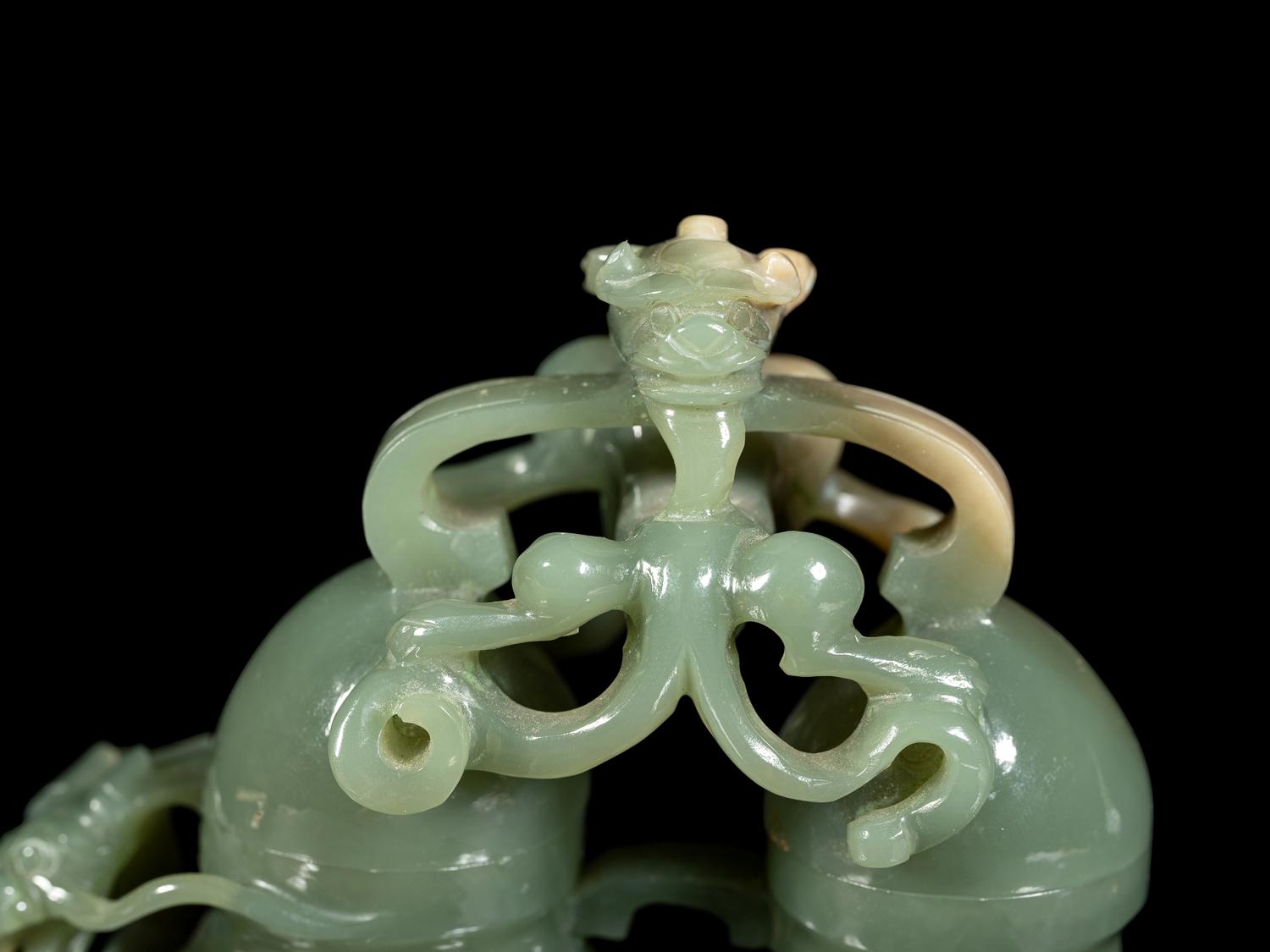 A Carved Serpentine Double Vase and Cover