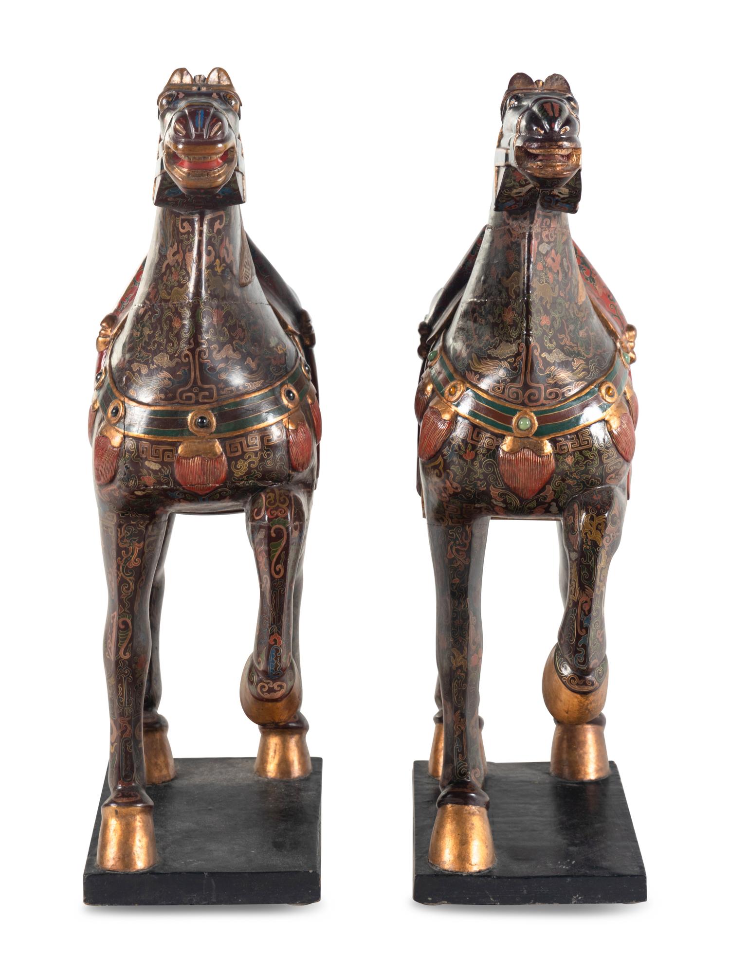 A Pair of Chinese Painted and Parcel Gilt Horses