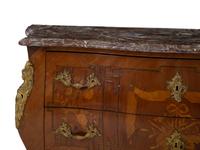 A Louis XV Style Gilt Bronze Mounted Marquetry and Kingwood Marble-Top Bombé Commode