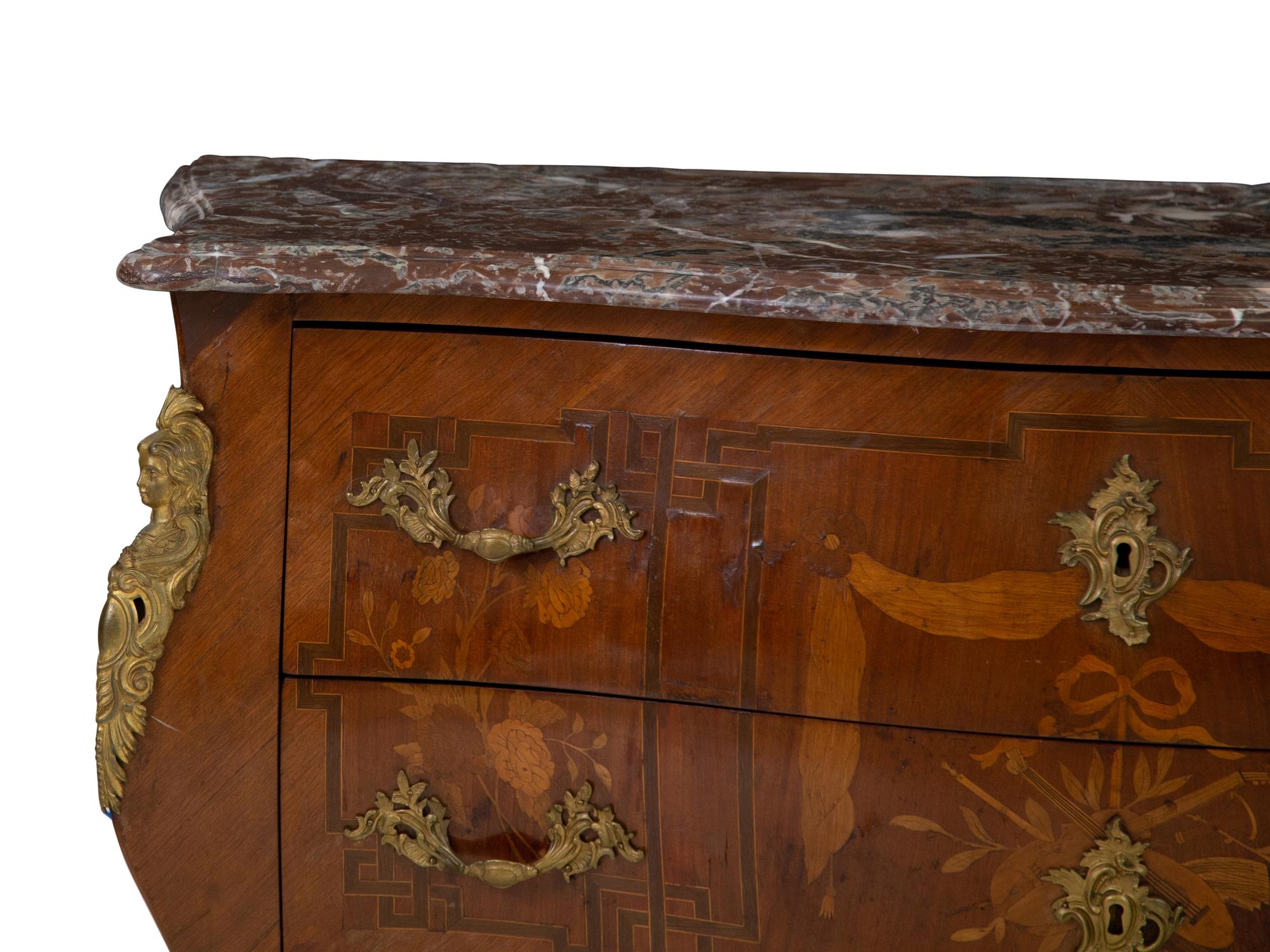 A Louis XV Style Gilt Bronze Mounted Marquetry and Kingwood Marble-Top Bombé Commode