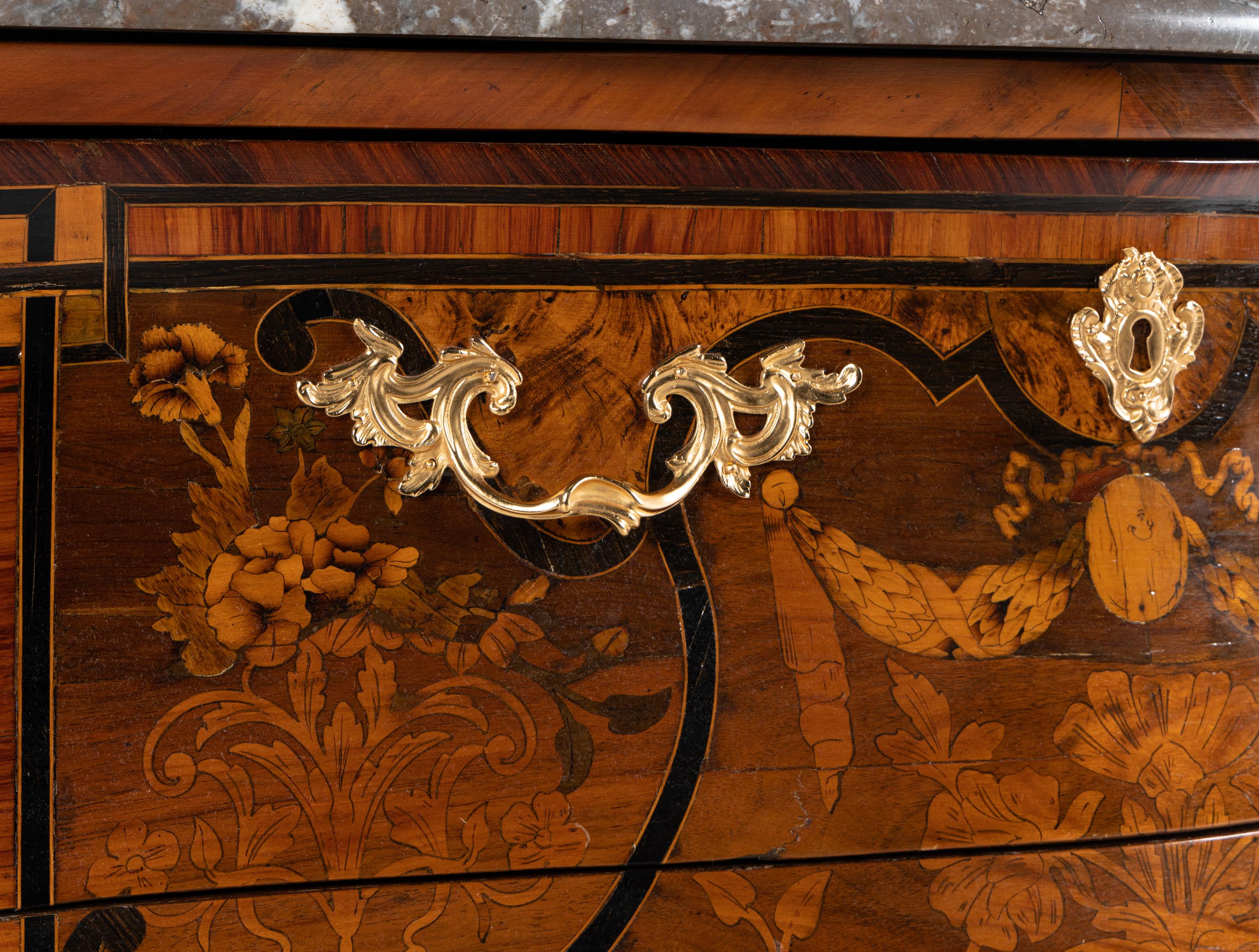 A Louis XV Style Gilt Bronze Mounted Marquetry Marble-Top Commode