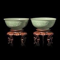 A Pair of Chinese Incised White Slip Decorated Celadon Ground Porcelain 'Bogu' Bowls, 18th/19th Century — 清中期 豆青地堆白博古图碗一对