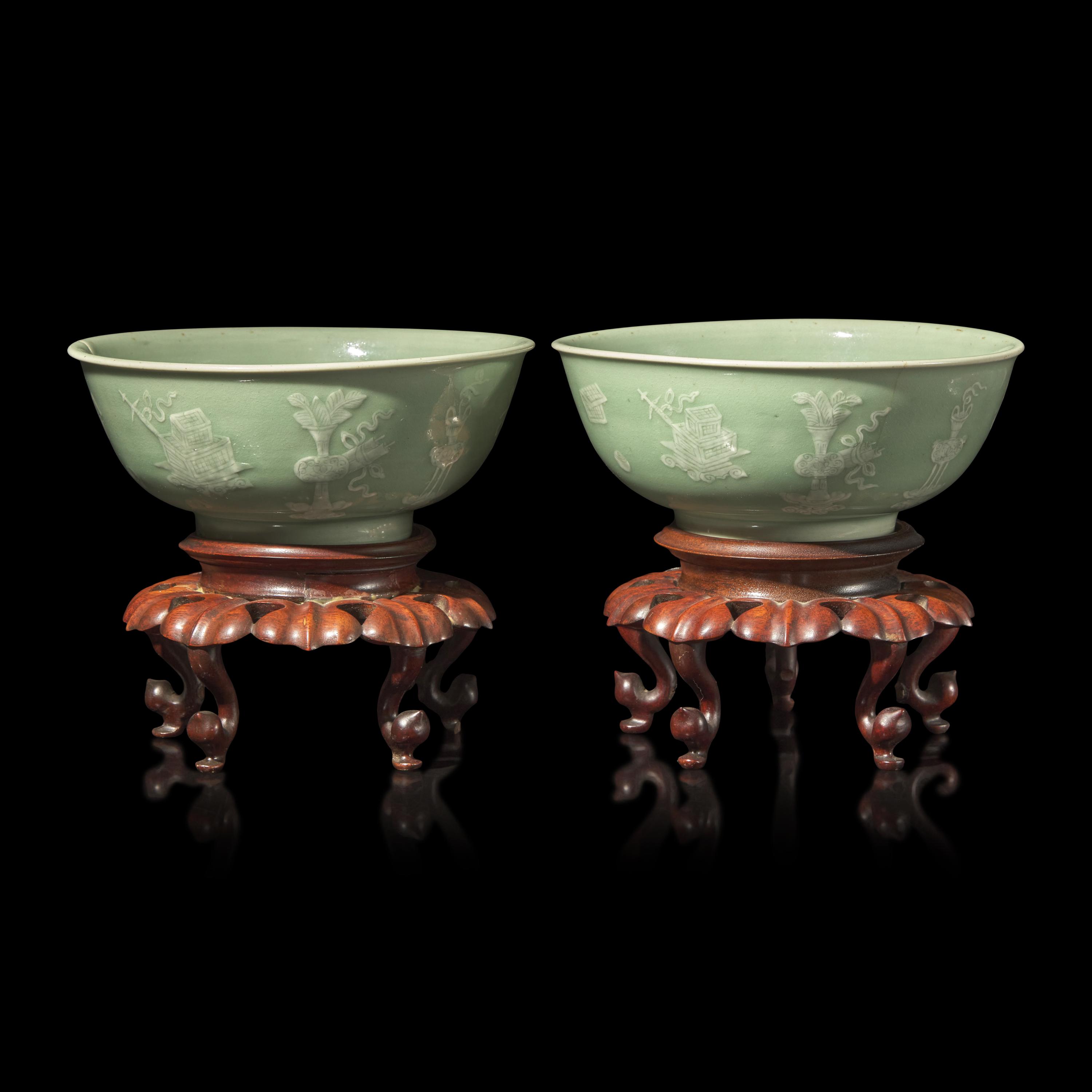 A Pair of Chinese Incised White Slip Decorated Celadon Ground Porcelain 'Bogu' Bowls, 18th/19th Century — 清中期 豆青地堆白博古图碗一对