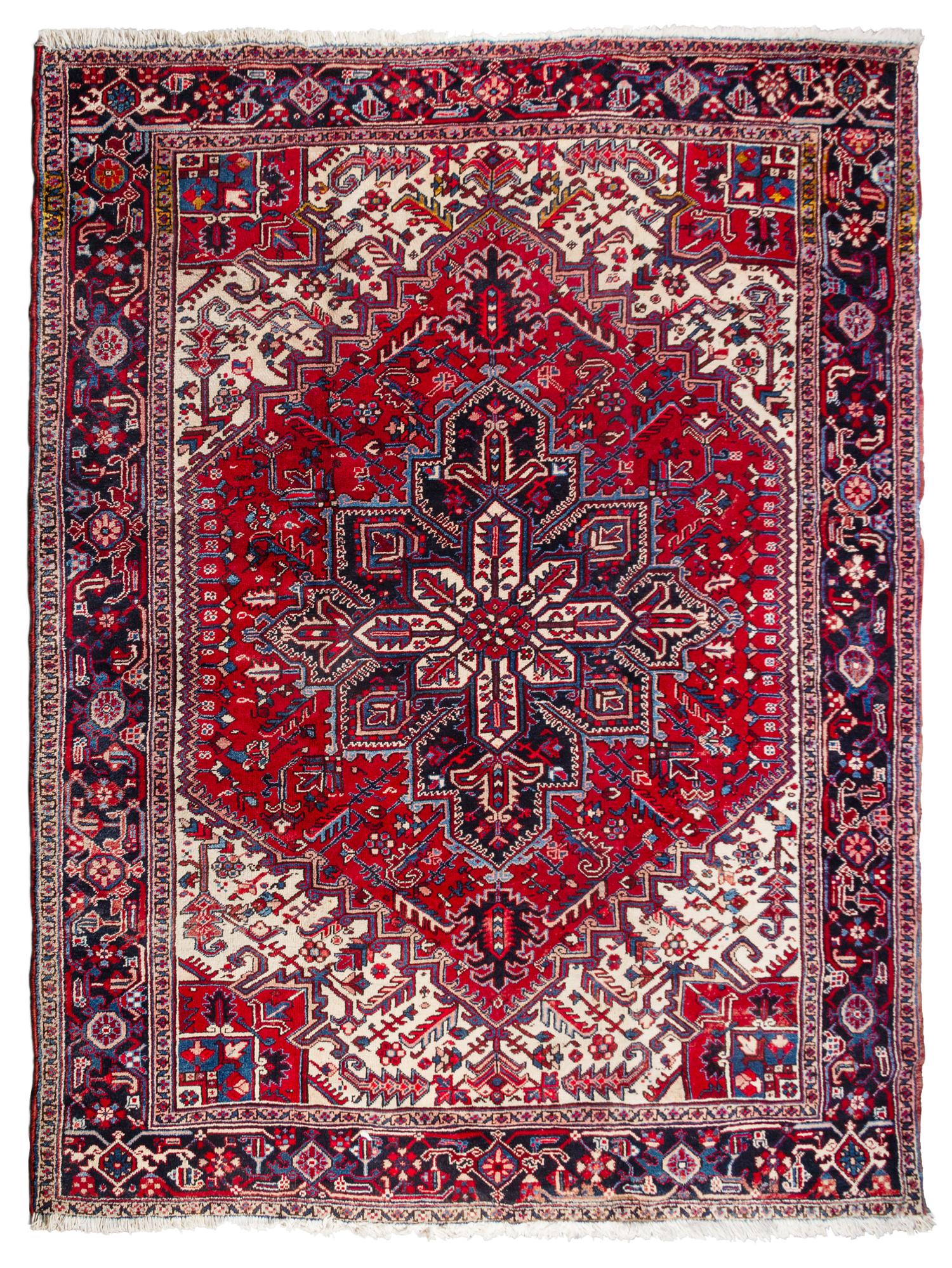 A Heriz Wool Rug 10 feet x 8 feet 4 1/2 inches. — CIRCA 1940s