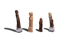 Four Near Eastern Stone and Terracotta Figures of Tanit